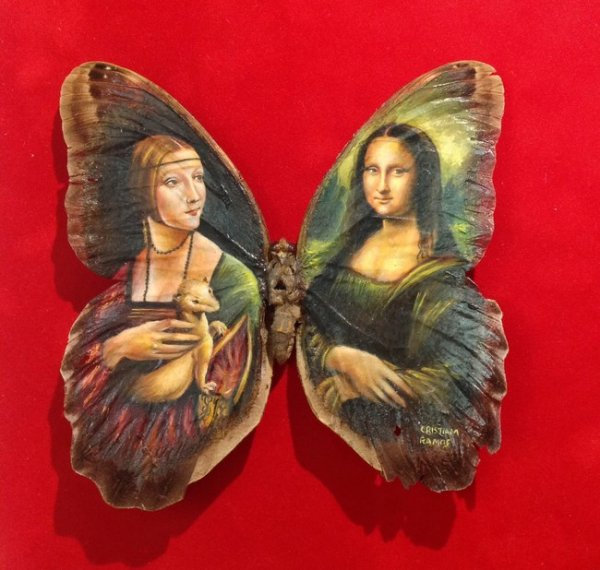 艺术家在蝴蝶翅膀上复制名画